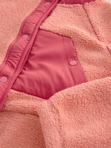 Next Tussenjas in Oranje