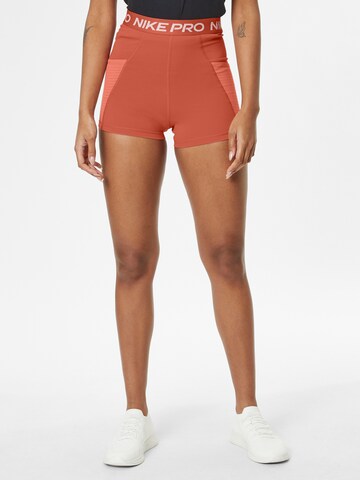 NIKE Skinny Sportovní kalhoty – oranžová: přední strana
