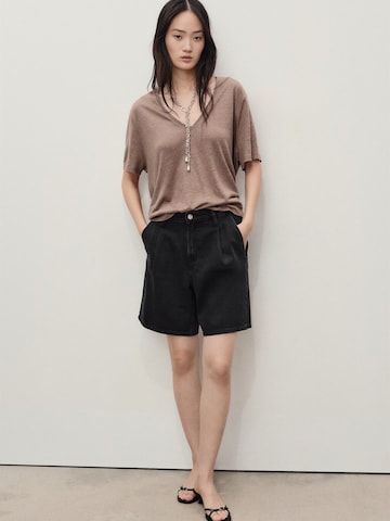 Largi Pantaloni cu cute 'MARINA' de la MANGO pe negru