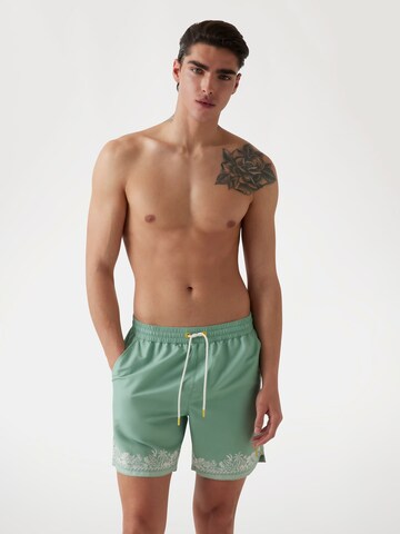 GUESS Board Shorts in Green: front