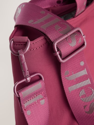 Borsa a mano di self. in rosso