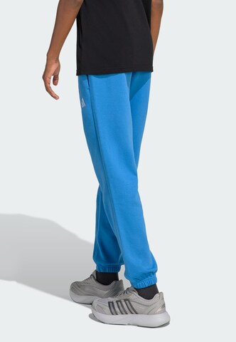 ADIDAS SPORTSWEAR Tapered Sportbroek 'Essentials' in Blauw