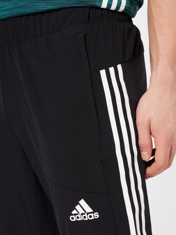 ADIDAS SPORTSWEAR Regular Workout Pants 'Train Icons ' in Black