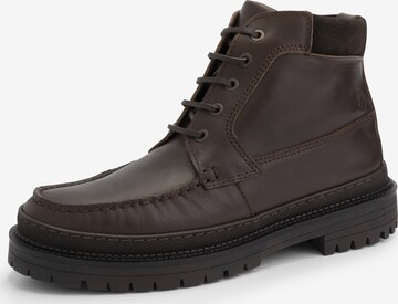 Travelin Boots in Brown: front