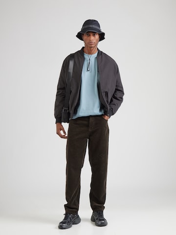 Carhartt WIP - Camiseta 'American Script' en azul