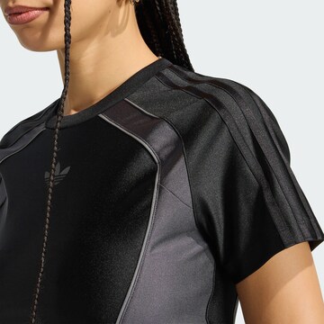 Maglia funzionale 'TEAMGEIST SLIM' di ADIDAS ORIGINALS in nero