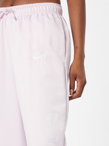 Nike Sportswear Tapered Housut värissä vaaleanpunainen