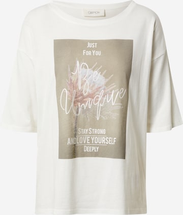 Cartoon T-shirt i beige: framsida