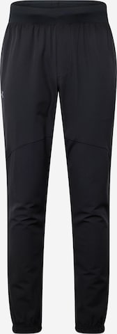 UNDER ARMOUR Дънки Tapered Leg Спортен панталон в черно: отпред