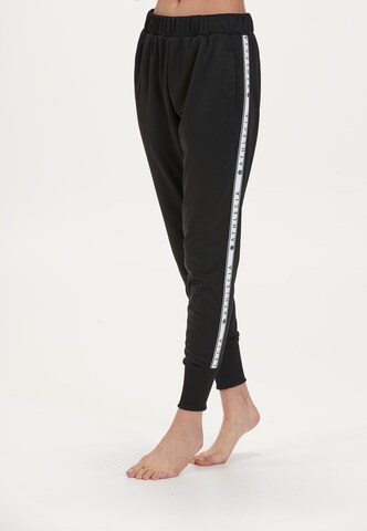 Athlecia Slimfit Sportbroek 'Sella' in Zwart: voorkant