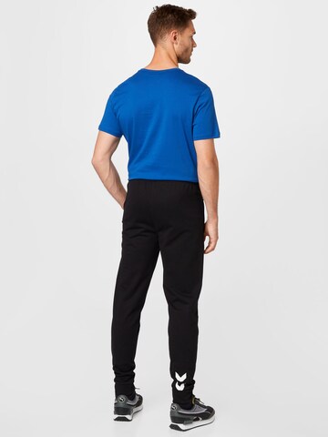 Hummel Slim fit Sports trousers in Black