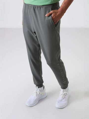 Effilé Pantalon de sport Tommy Life en gris
