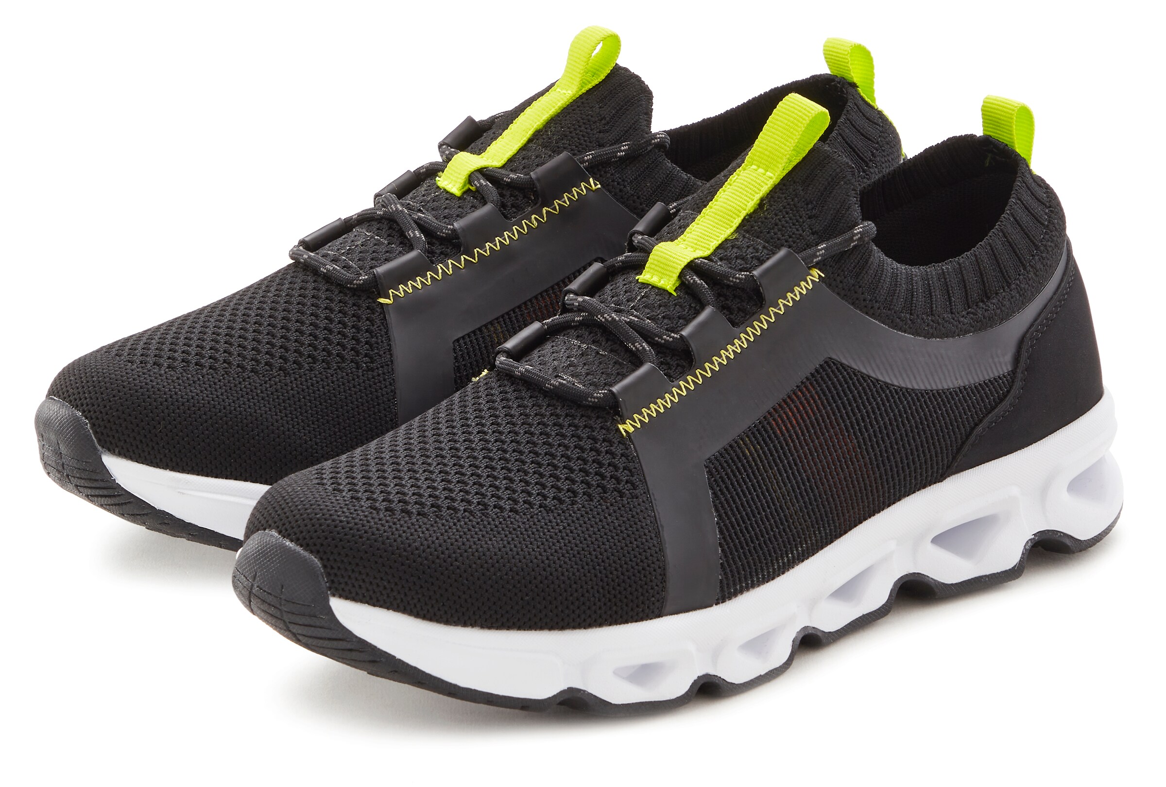 JOHN DEVIN Slip-Ons in Black