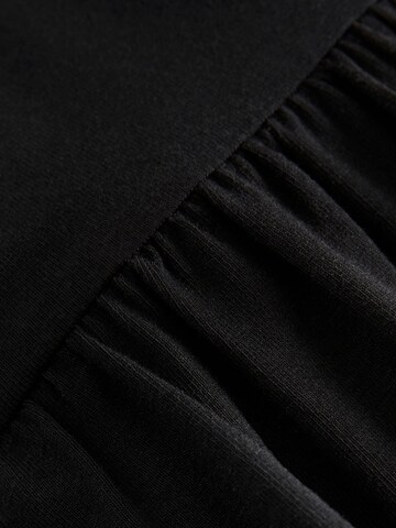 Robe Next en noir