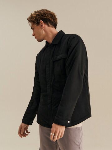 About You x Nils Kuesel Between-Season Jacket 'Jesse' in Black: front