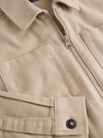 Next Övergångsjacka i grå