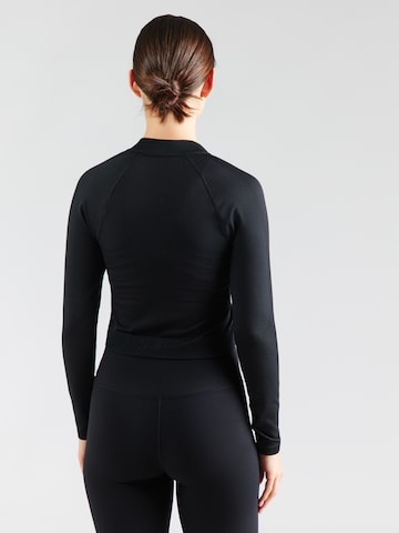 Bluză cu fermoar sport de la NIKE pe negru