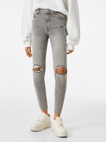 Bershka Jeans in Grey: front