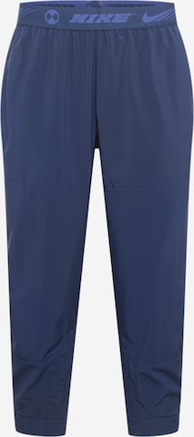 NIKE Sports trousers in Blue: front