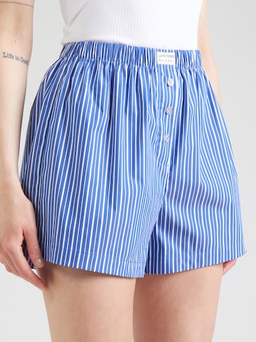 OH APRIL Loosefit Broek 'OH APRIL x LOVE Stories - James' in Blauw: voorkant
