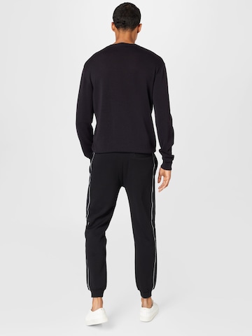 GUESS Tapered Hose 'MICKEY' in Schwarz