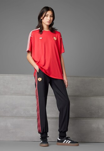 ADIDAS ORIGINALS - regular Pantalón deportivo 'Manchester United Terrace Icons' en negro