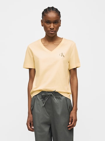 Calvin Klein Jeans Póló - sárga: elől