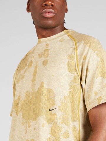 NIKE Performance shirt 'ADV' in Yellow