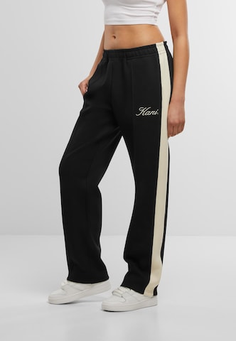 Loosefit Pantaloni con piega frontale di Karl Kani in nero