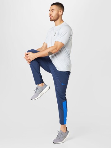 NIKE Regular Sporthose in Blau