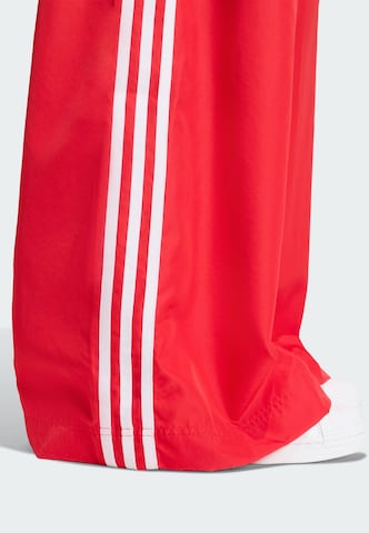 ADIDAS ORIGINALS Wide leg Trousers 'Firebird Adilenium' in Red