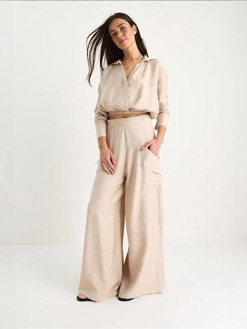 Pantalons de tailleur Bianco Lucci en beige