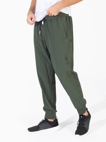 Spyder - Tapered Pantalón deportivo en verde: frente