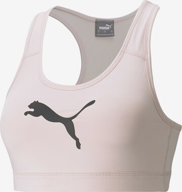 Bustino Reggiseno sportivo di PUMA in rosa