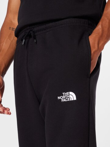 THE NORTH FACE - Tapered Calças 'ESSENTIAL' em preto