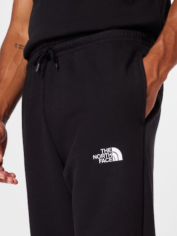 THE NORTH FACE Tapered Παντελόνι 'ESSENTIAL' σε μαύρο