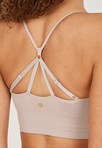 Athlecia Regular Sports bra 'Foan' in Pink