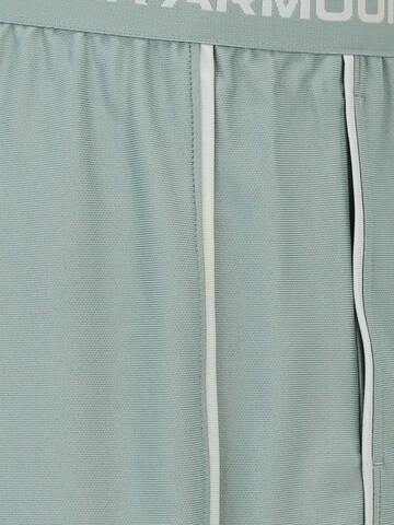 UNDER ARMOUR Normalny krój Spodnie sportowe 'Play Up' w kolorze zielony
