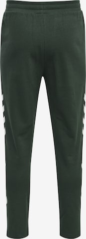 Hummel Zúžený Sportovní kalhoty 'Legacy' – zelená