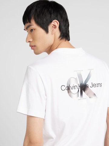 Calvin Klein Jeans Bluser & t-shirts 'EUPHORIC' i hvid