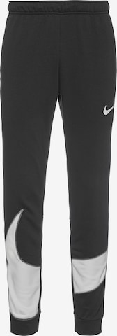 NIKE Tapered Athletic Pants in Black: front