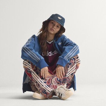 ADIDAS ORIGINALS Szeroka nogawka Spodnie 'Liberty London Firebird' w kolorze niebieski