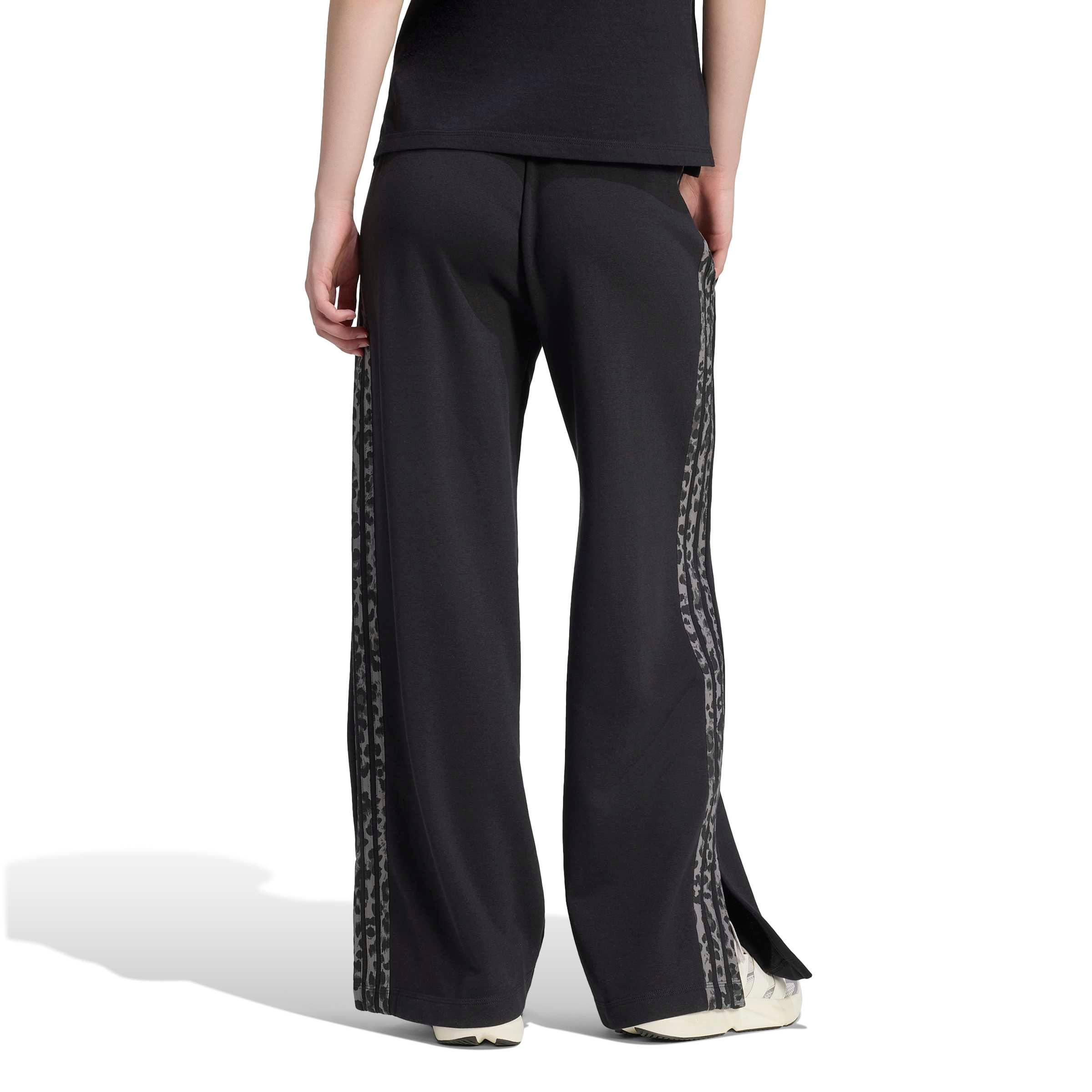 ADIDAS SPORTSWEAR - Pierna ancha Pantalón deportivo en negro