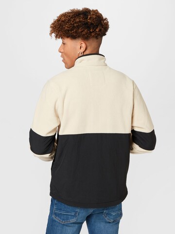 Tommy Jeans Fleecetakki värissä beige