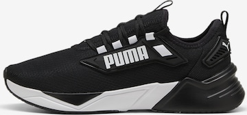 Chaussure de course 'Retaliate 3' PUMA en noir : devant