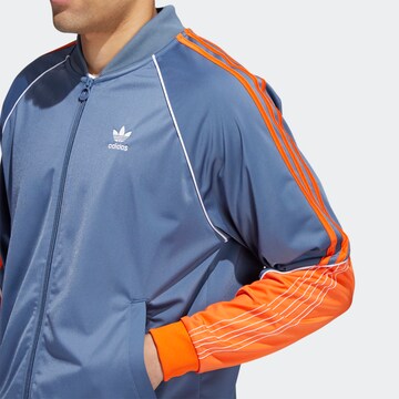 ADIDAS ORIGINALS Between-Season Jacket 'Tricot Sst' in Blue