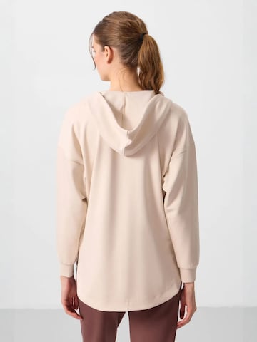 Sweat-shirt Tommy Life en beige