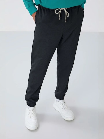 Tapered Pantaloni di Tommy Life in nero