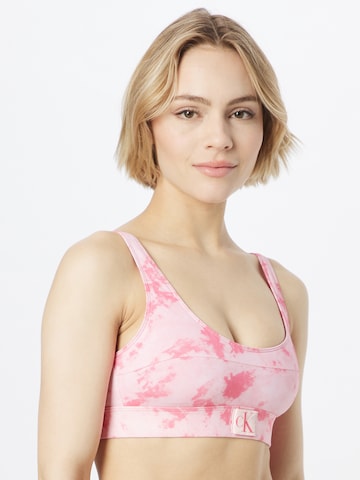 Calvin Klein Swimwear Bygelfri Bikiniöverdel i rosa: framsida