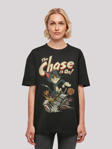 Maglia extra large 'Tom und Jerry The Chase Is On' di F4NT4STIC in nero: frontale